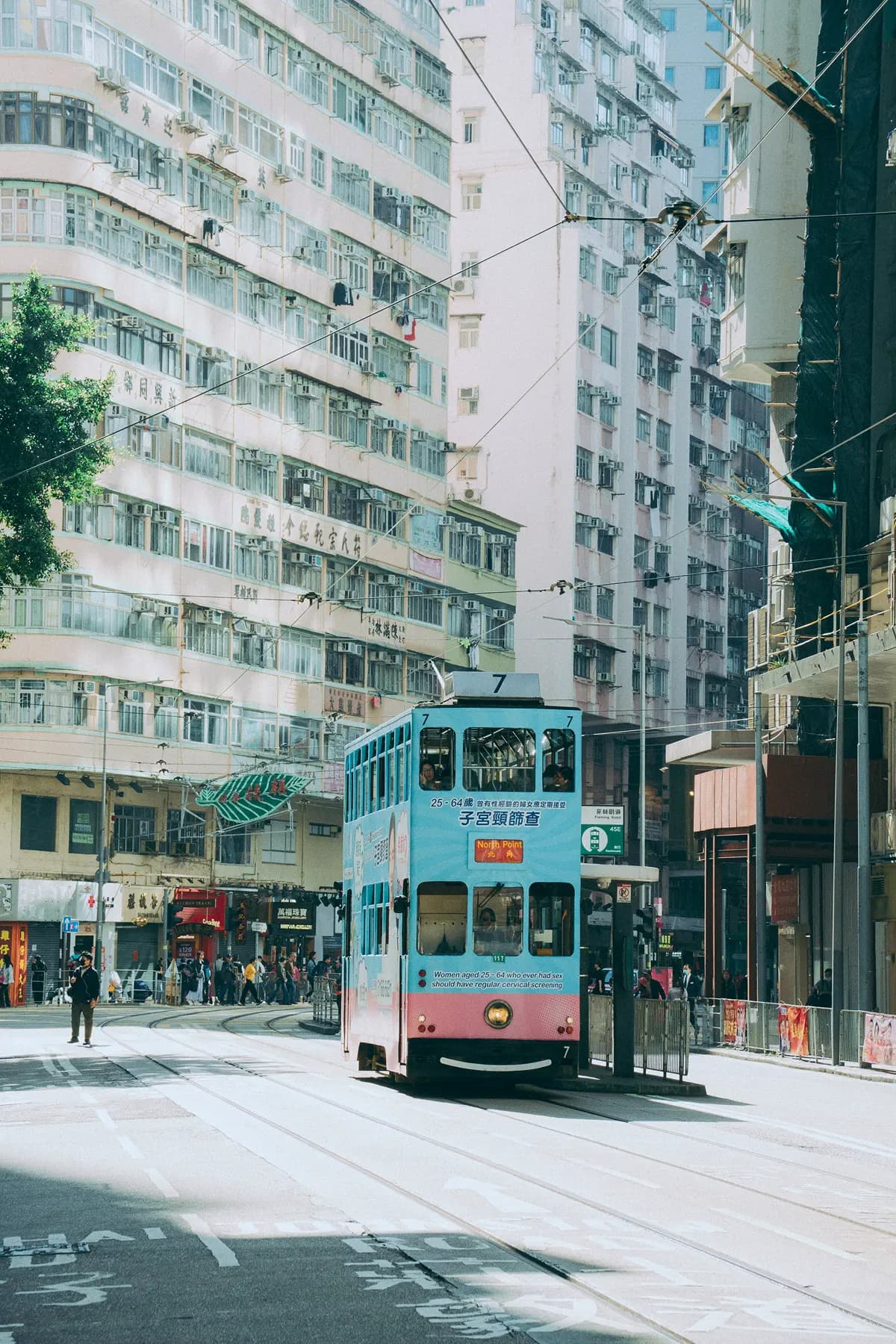 The historic tram passing through the streets of Hong Kong Island